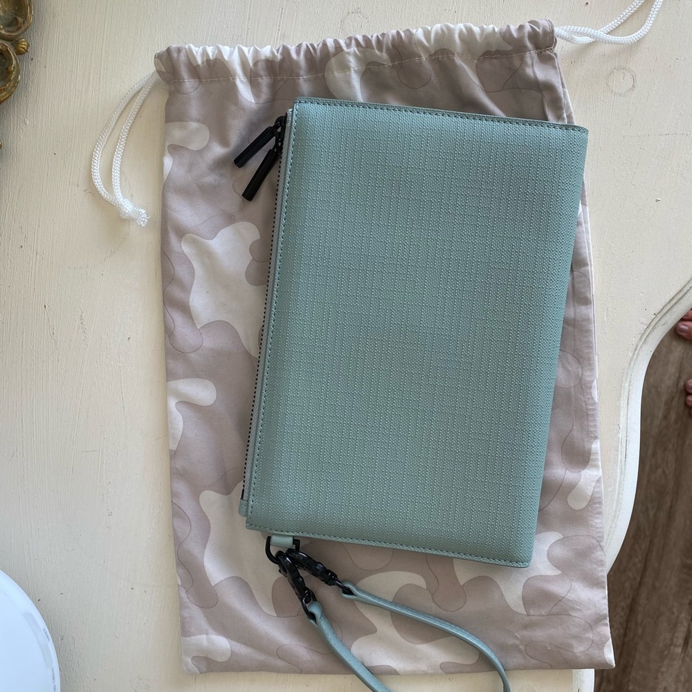 Like new Dagne Dover essentials clutch